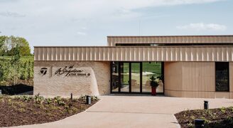 the main entrance of the kingdom at the grove showing the schuco entrance door